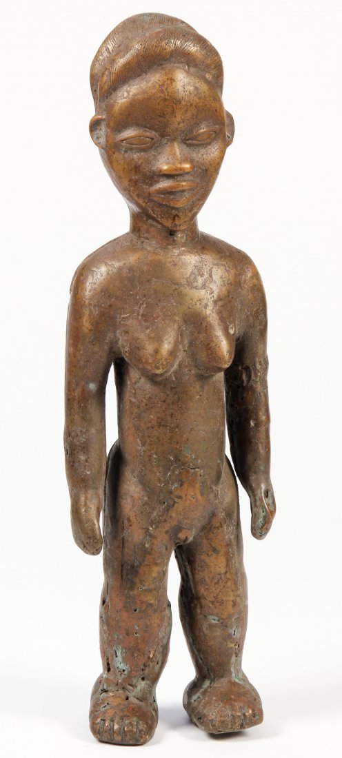 Baule Bronze Female: Baule African Bronze Female. Provenance: Charles Hudgins collection, founder of the Minnesota Antiques Dealer Association. Size: 21" x 6" x 4" (53 x 15 x 10 cm).