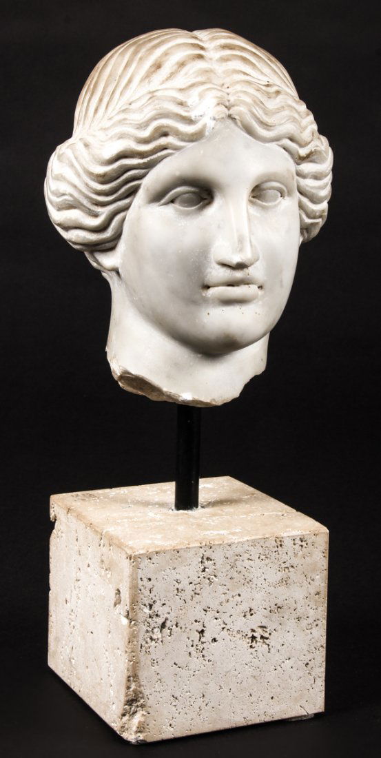 Antique Carved Italian Marble Head: Antique Carved Italian Marble Head of the Roman Goddess Minerva, on a travertine block base, 18th c. or older. Sculpture measures: 8"H x 6"W x 7.5"D (20 x 15 x 19 cm); overall height: 15" (38 cm). Pro
