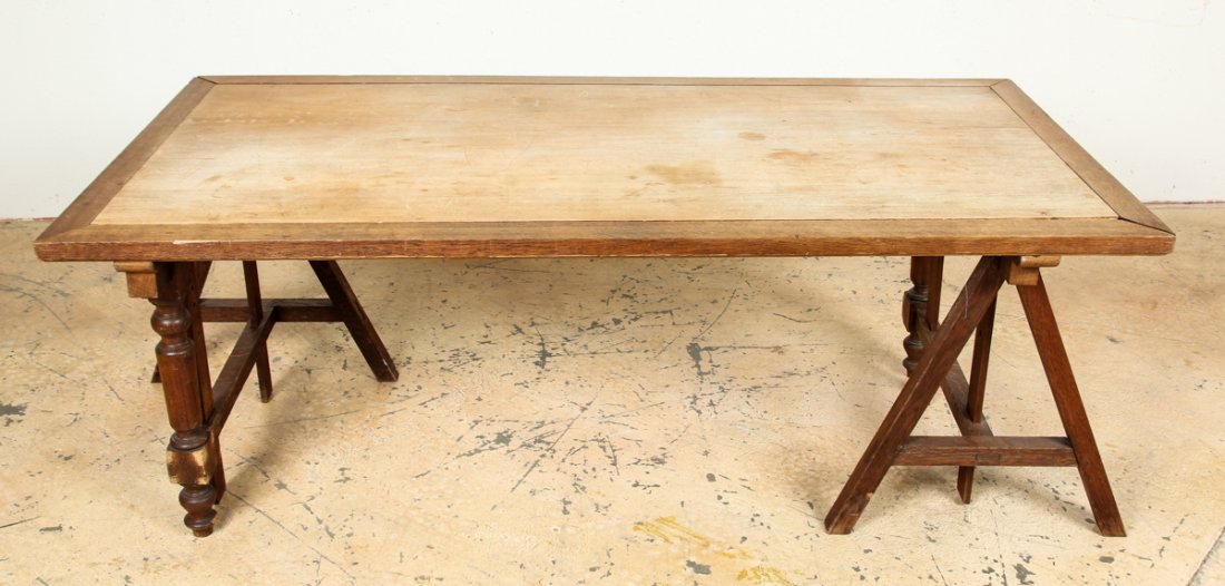 Trestle Leg Architect Table: Trestle Leg Architect Table. Adjustable height breadboard top over saw horse type legs. Size: 28.5" x 78.5" x 38.5" (72 x 199 x 98 cm). Prov: Estate of Sharon Simonaire, NYC.