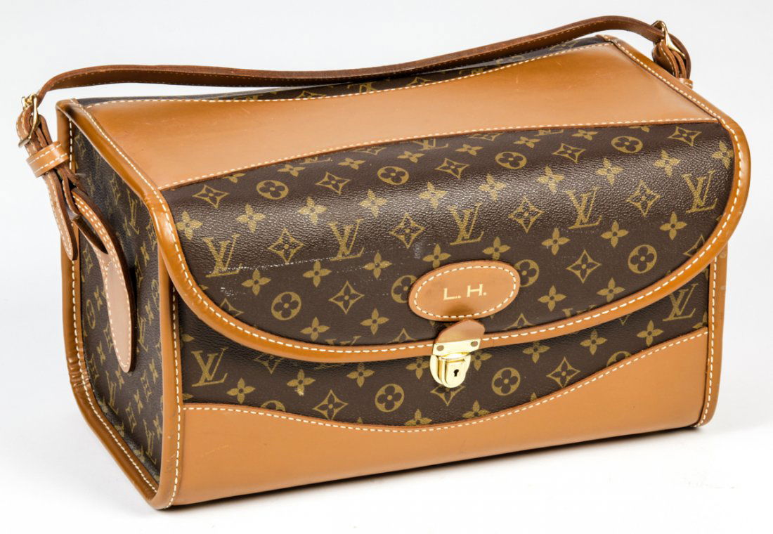 Lena Horne's Louis Vuitton Soft Leather Vanity Case: Lena Horne's Louis Vuitton Soft Leather Vanity Train Case. Monogrammed L.H. Size: 9" x 15.5" x 9" (23 x 39 x 23 cm). Provenance: Estate of Lena Horne.