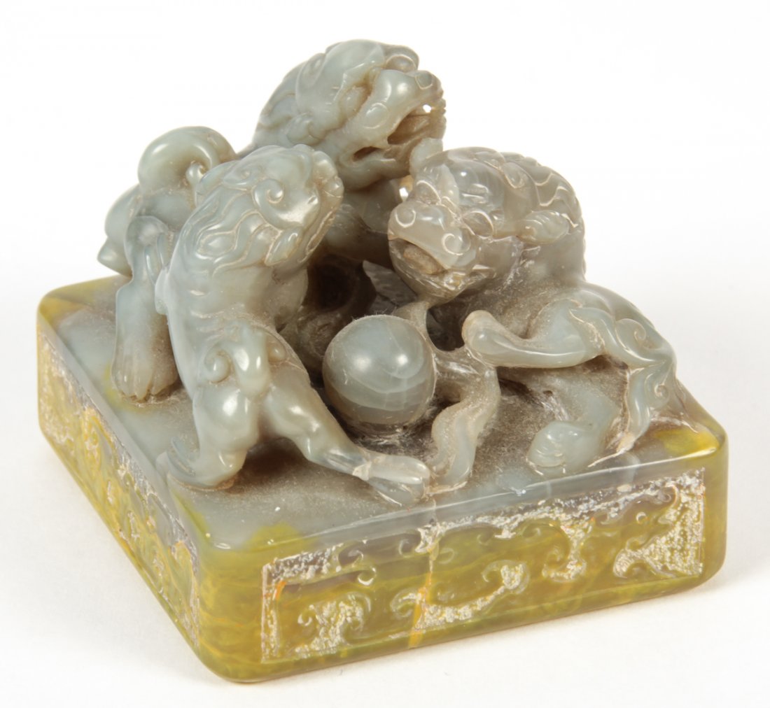 Chinese Carved Jade or Hardstone Chop Seal: Chinese Carved Jade or Hardstone Chop Seal. Frolicking foo dog motif. Size: 2" x 2" x 2" (5 x 5 x 5 cm).