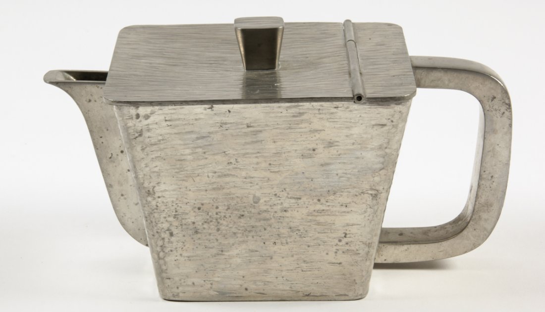 Marie Claude Berard Pewter Teapot: Marie Claude Berard Pewter Teapot. French. Size: 4" x 7.5" x 4.75" (10 x 19 x 12 cm). Estate of Sharon Simonaire, NYC.