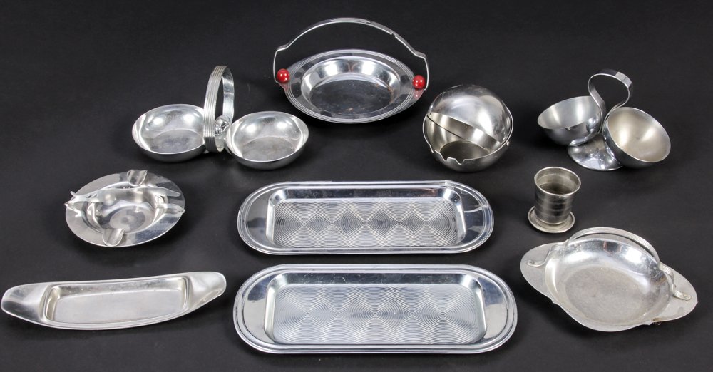 Vintage Metal Bar Accessories: Vintage Metal Bar Accessories. Consisting of nut dishes, ashtrays, and condiment trays. Size: Largest measures 5" x 8" x 7" (13 x 20 x 18 cm).