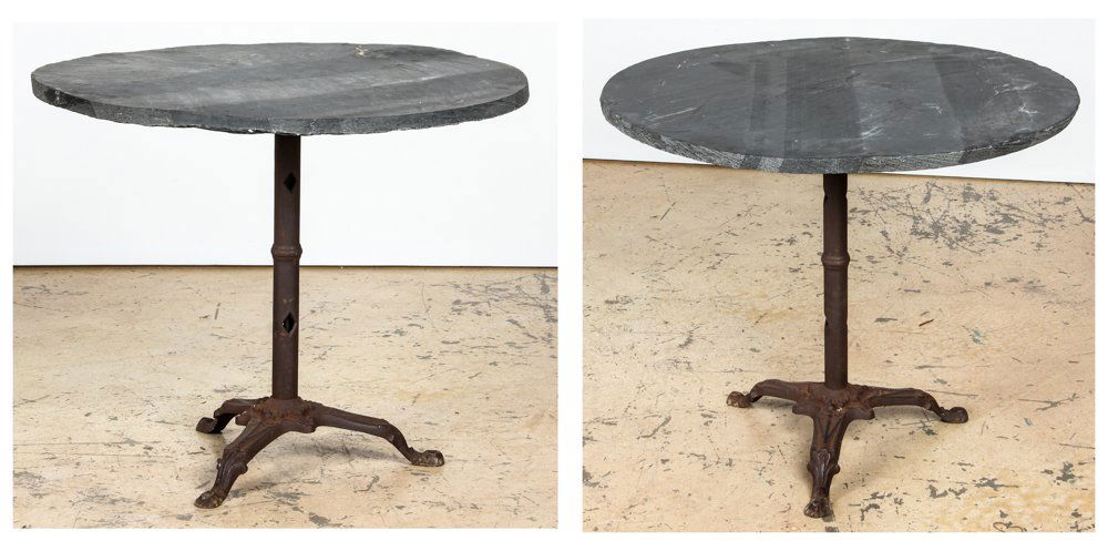 Pair Slate Top Cafe Tables: Pair Slate Top Cafe Tables, with old cast metal bases. Each Size: 29" x 34.5" x 34.5" (74 x 88 x 88 cm). Provenance: DeHoogh Gallery, Philadelphia.