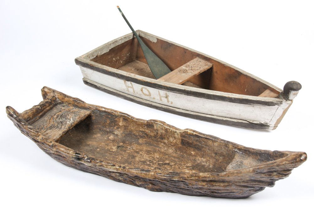 2 Folk Art Boats: 2 Folk Art Boats. The first of painted wood with carved figural bust on bow, the other of glazed earthenware. Size: 5" x 26" x 8", 13 x 66 x 20 cm (largest). Provenance: DeHoogh Gallery, Philadelphia.