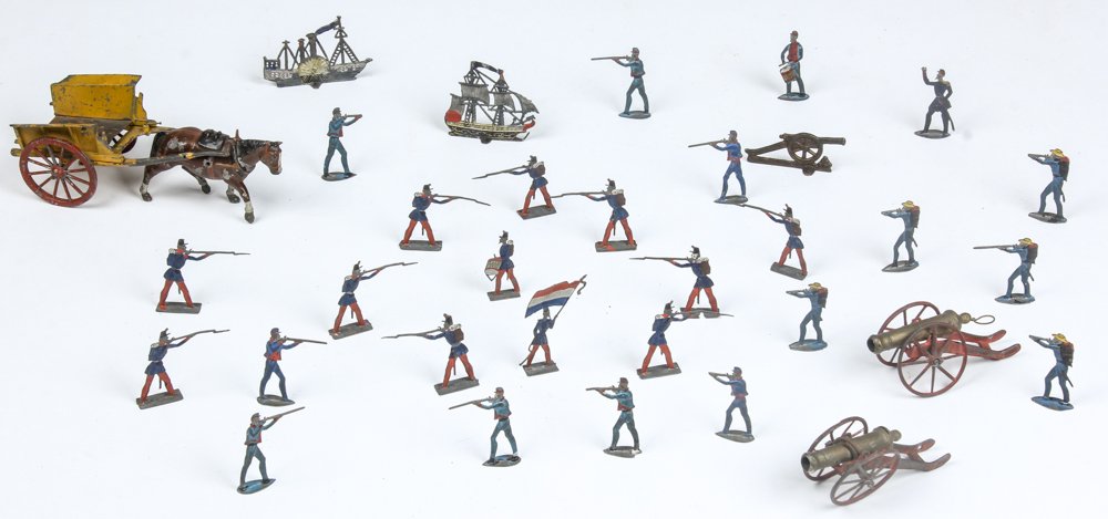 Antique Child's Soldier Kit in a Double Slide Box: Antique Child's Soldier Kit in a Double Slide Box. With soldiers, cannons, ships both sail and steam. Seemingly French. Size: 3" x 6" x 2.5", 8 x 15 x 6 cm (largest); 6.25" x 17" x 18.5", 16 x 43 x 6