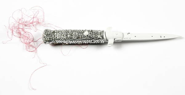 Terence Koh / ASIANPUNKBOY (20th c.) Grease Switchblade: Terence Koh / ASIANPUNKBOY (Canadian/Chinese,b. 1977) Grease Switchblade, 2003, signed. Mixed media: switchblade, rhinestones, paint, string. Condition: areas of paint loss to the blade. Size: approx.