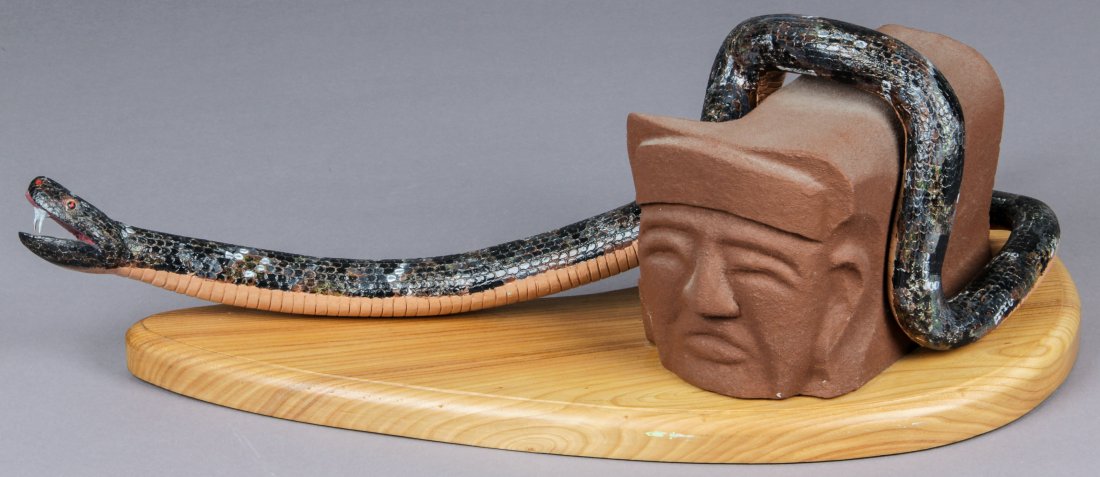 John J. Stanko (American, 1925-2014) Sculpture: John J. Stanko (American, 1925-2014) Sculpture, Mayan Snake, carved wood, mixed media. Size: 10.5" x 27" x 16" (27 x 69 x 41 cm). Provenance: estate of the artist. The sale debuts the work of a newly-