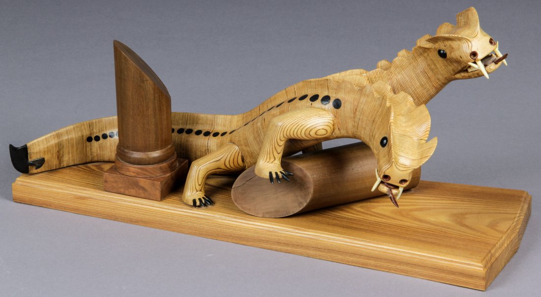 John J. Stanko (American, 1925-2014) Sculpture: John J. Stanko (American, 1925-2014) Sculpture, Double-Headed Dragon, carved wood, mixed media. Size: 12" x 24" x 9" (30 x 61 x 23 cm). Provenance: estate of the artist. The sale debuts the work of a 