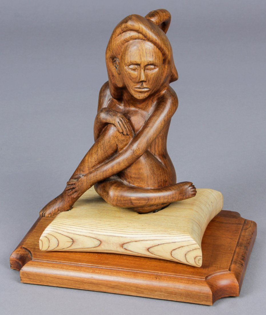John J. Stanko (American, 1925-2014) Sculpture: John J. Stanko (American, 1925-2014) Sculpture, Woman Sitting on Pillow, carved wood. Size: 11.5" x 10" x 7" (29 x 25 x 18 cm). Provenance: estate of the artist. The sale debuts the work of a newly-di