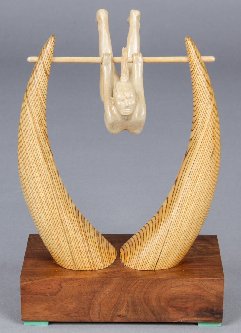 John J. Stanko (American, 1925-2014) Sculpture: John J. Stanko (American, 1925-2014) Sculpture, Swinging Woman, carved wood. Size: 13" x 8.25" x 4" (33 x 21 x 10 cm). Provenance: estate of the artist. The sale debuts the work of a newly-discovered 