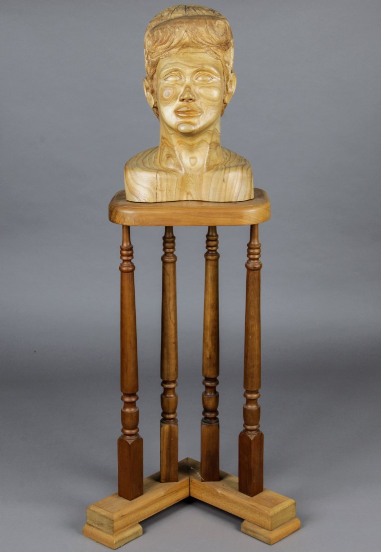 John J. Stanko (American, 1925-2014) Sculpture: John J. Stanko (American, 1925-2014) Sculpture, Bust of Woman on Base, carved wood. Size: 49" x 14" x 10" (125 x 36 x 25 cm). Provenance: estate of the artist. The sale debuts the work of a newly-disc