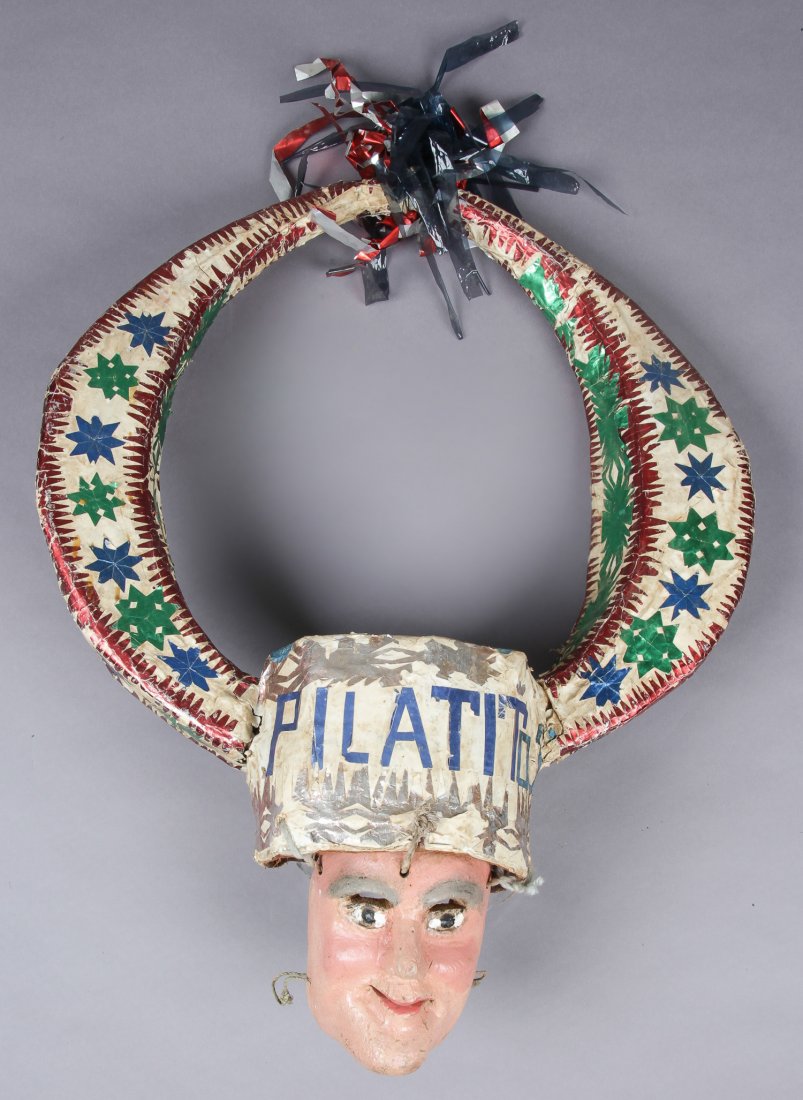 Mexican Carnival Mask: Mexican Carnival mask. Carved and painted wood, papier mache, with foil bark and plastic appliques. Size: 31" x 21" x 8" (79 x 53 x 20 cm). Prov: Richard and Jean Kellaway; Danforth Museum, Framingham