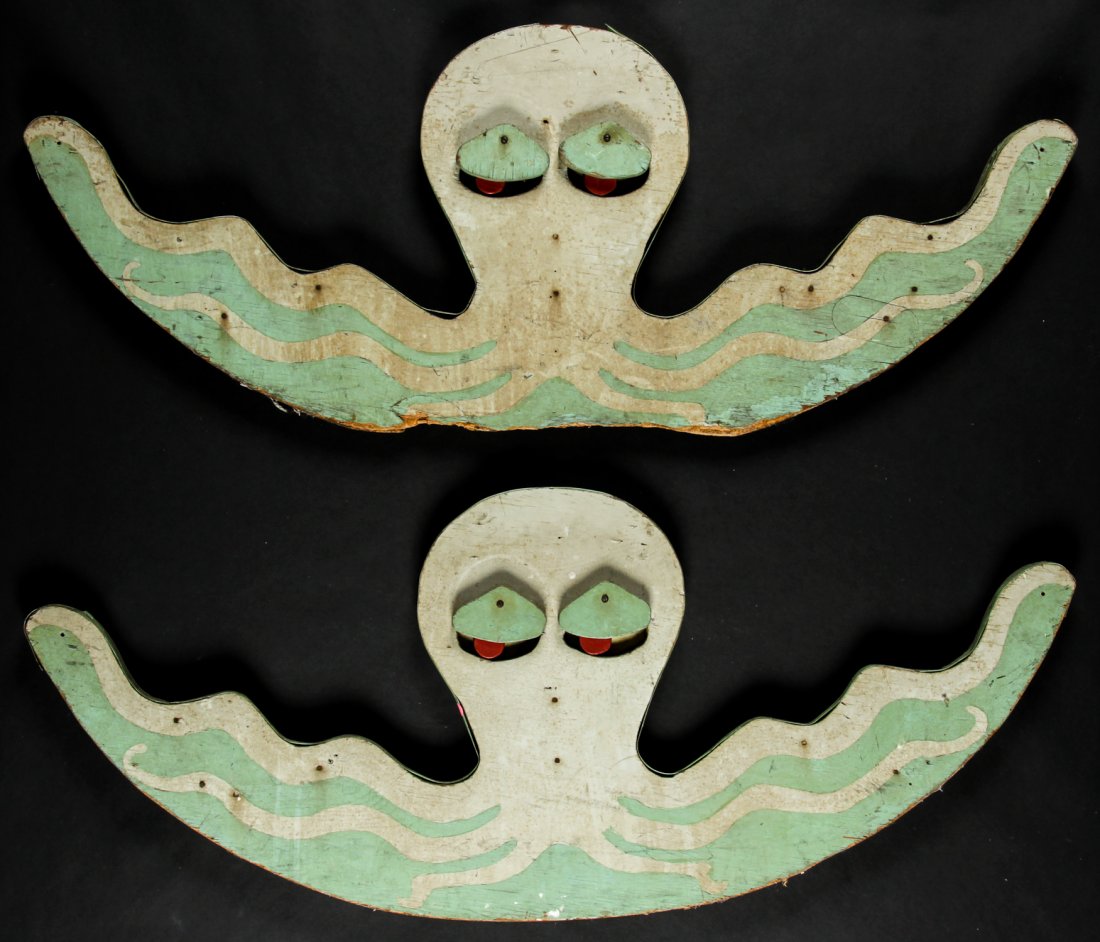 Pair Octopus Midway Ride Fascia Boards, Early/Mid 20th: Pair Octopus Midway Ride Fascia Boards, Early/Mid 20th C. With kinetic pendulous eyelids. Original paint decoration. Each Size: 22" x 57" x 2.5" (56 x 145 x 6 cm). Provenance: Kristina Barbara Johnson