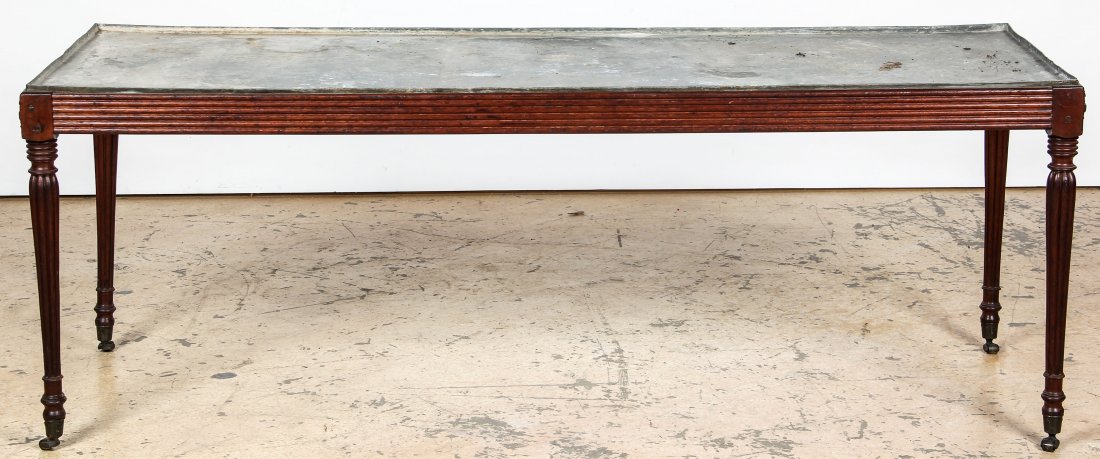 Antique English Mahogany Jardiniere Table: Antique English Mahogany Jardiniere Table. Galvanized zinc dish top tray over reeded apron on balustrade legs. Size: 24.25" x 66" x 24.25" (62 x 168 x 62 cm). Provenance: Kristina Barbara Johnson Esta