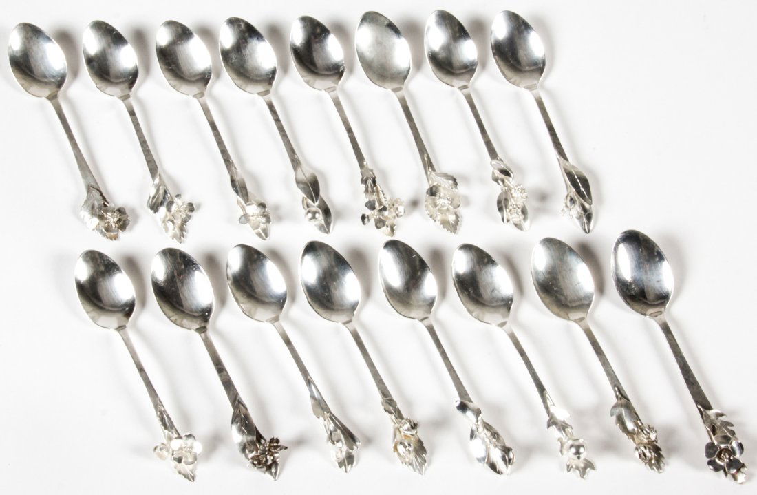 Sterling Silver Botanical Theme Ice Cream Spoons: Sterling Silver Botanical Theme Ice Cream Spoons. Marked Sterling N Frost. Each spoon engraved with species name. Provenance: Kristina Barbara Johnson Estate, Princeton, New Jersey.
