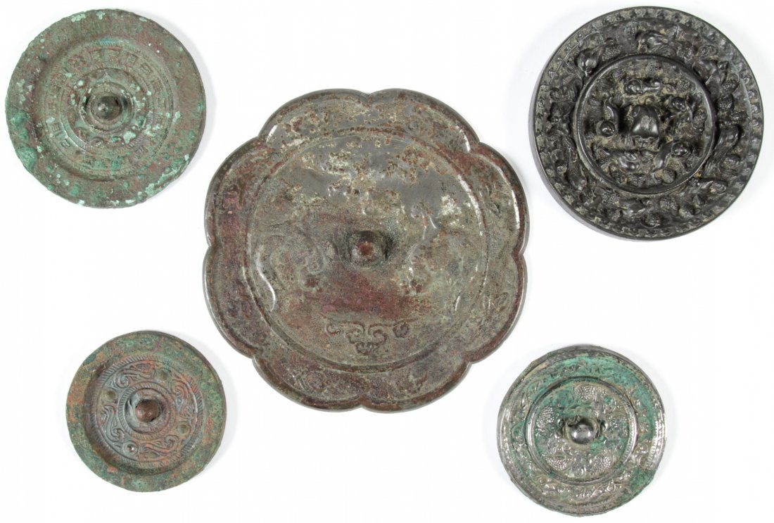 5 Antique Chinese Bronze Mirrors: 5 Antique Chinese Bronze Mirrors, archaic style, attributed to Song, Han and Tang Dynasties. Largest Size: 7" x 7.25" (18 x 18.5 cm). Provenance: Estate of Robert Swan Lindsley and Eric Hoage, Philade