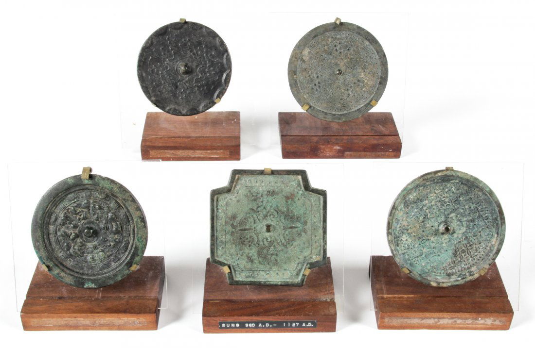 5 Antique Chinese Bronze Mirrors: 5 Antique Chinese Bronze Mirrors, archaic style, attributed to Song, Han and Tang Dynasties. Largest Size: 5" x 5" (13 x 13 cm). Provenance: Estate of Robert Swan Lindsley and Eric Hoage, Philadelphia