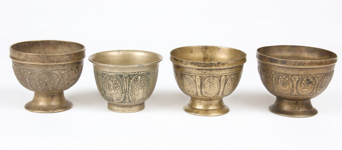 4 Bronze Bowls (Batuka): 4 Bronze Bowls (Batuka), Nepal, circa 1900, decorated with various motifs including peacocks and flowers. Largest Size: 3.5" x 4.5" x 4.5" (9 x 11 x 11 cm). Total weight: 1485 grams. Provenance: Matth