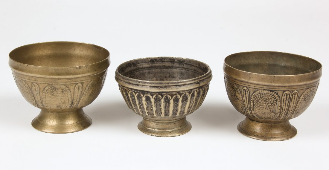 3 Bronze Bowls (Batuka): 3 Bronze Bowls (Batuka), Nepal, circa 1900; one with ribbed sides, heavy; two decorated with peacocks. Largest Size: 3.5" x 4.5" x 4.5" (9 x 11 x 11 cm). Total weight: 1500 grams. Provenance: Matthew 