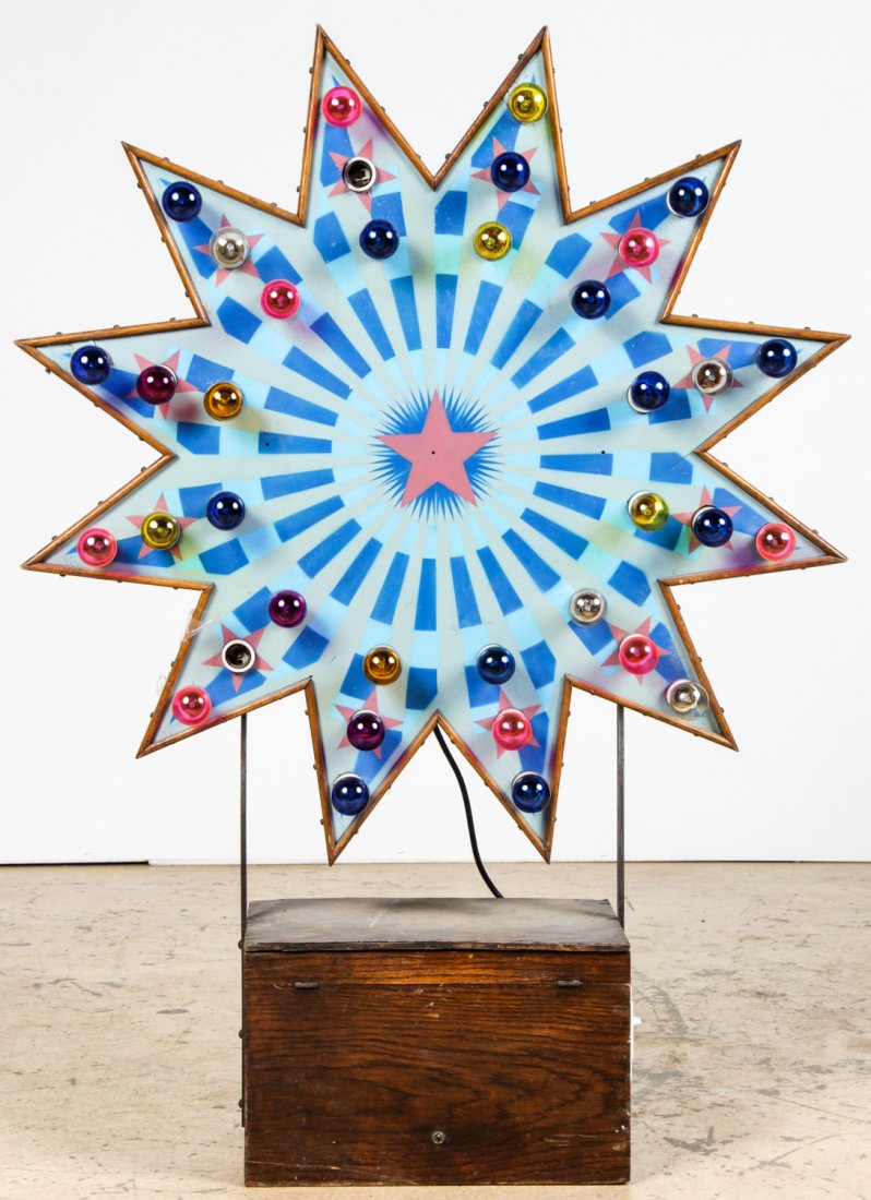 Carnival Midway Flashing Starburst: Carnival Midway Flashing Starburst, the flashing mechanism has been disconnected. Size: 51.5" x 37" x 11.5" (131 x 94 x 29 cm). Provenance: David Bradley Armstrong Estate.