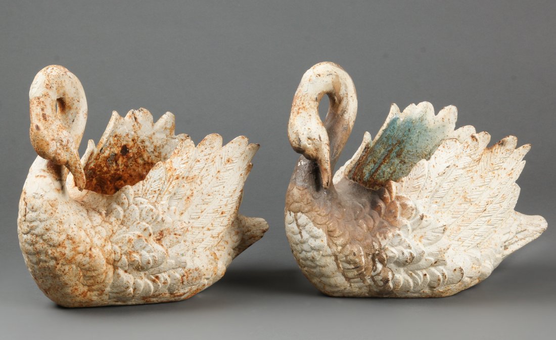 2 Cast Iron Swan Form Jardinieres: 2 Cast Iron Swan Form Jardinieres. Size: 15" x 10" x 17" (38 x 25 x 43 cm). Provenance: David Bradley Armstrong Estate.