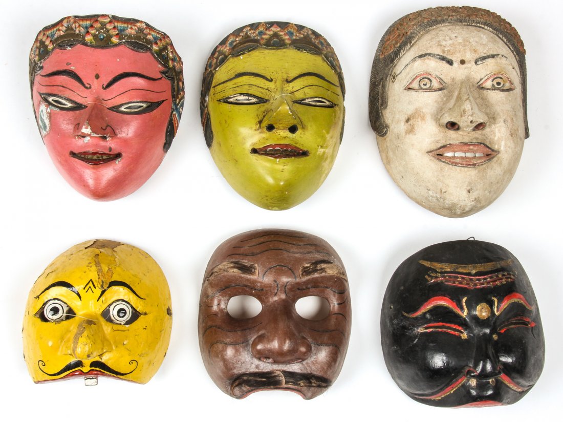 6 Vintage Indonesian Masks: 6 Vintage Indonesian Masks. Largest Size: 8.5" x 6.25" x 4" (22 x 16 x 10 cm). Prov: Richard and Jean Kellaway.