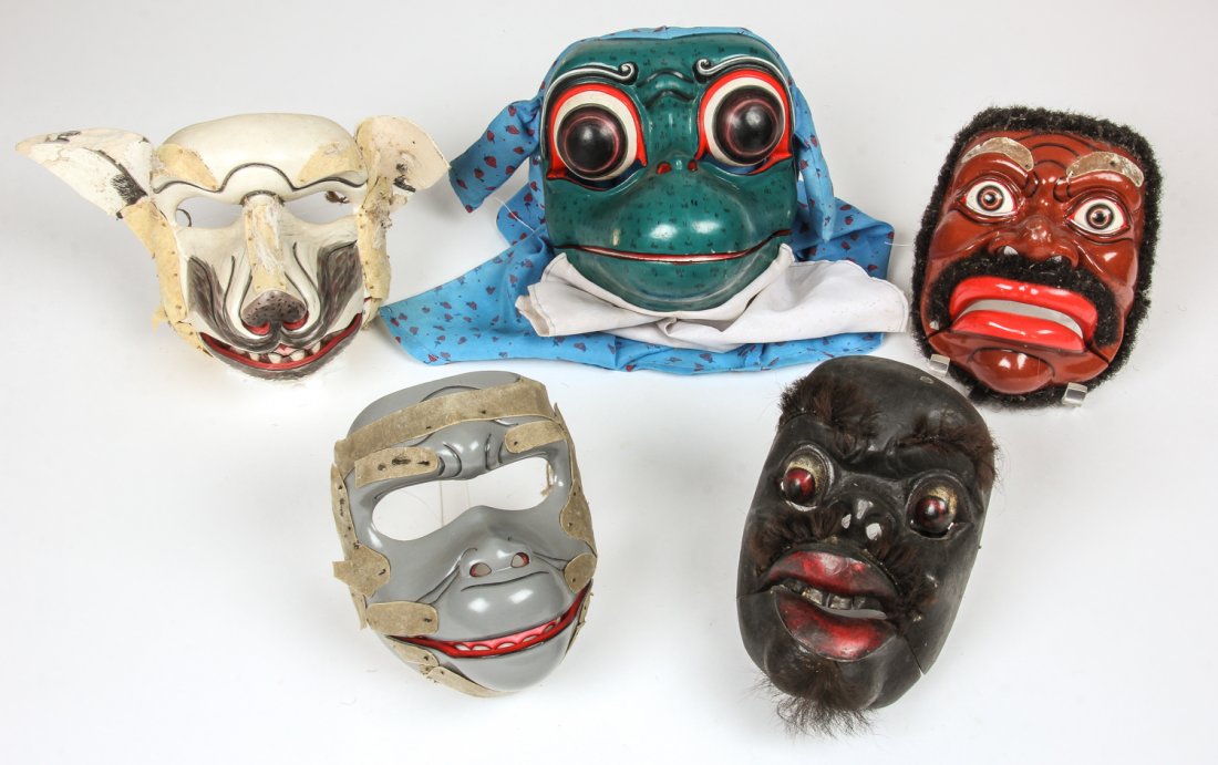 5 Vintage Kinetic Indonesian Masks: 5 Vintage Kinetic Indonesian Masks. Each with articulated jaws. Largest Size: 7.5" x 8" x 8" (19 x 20 x 20 cm). Prov: Richard and Jean Kellaway.