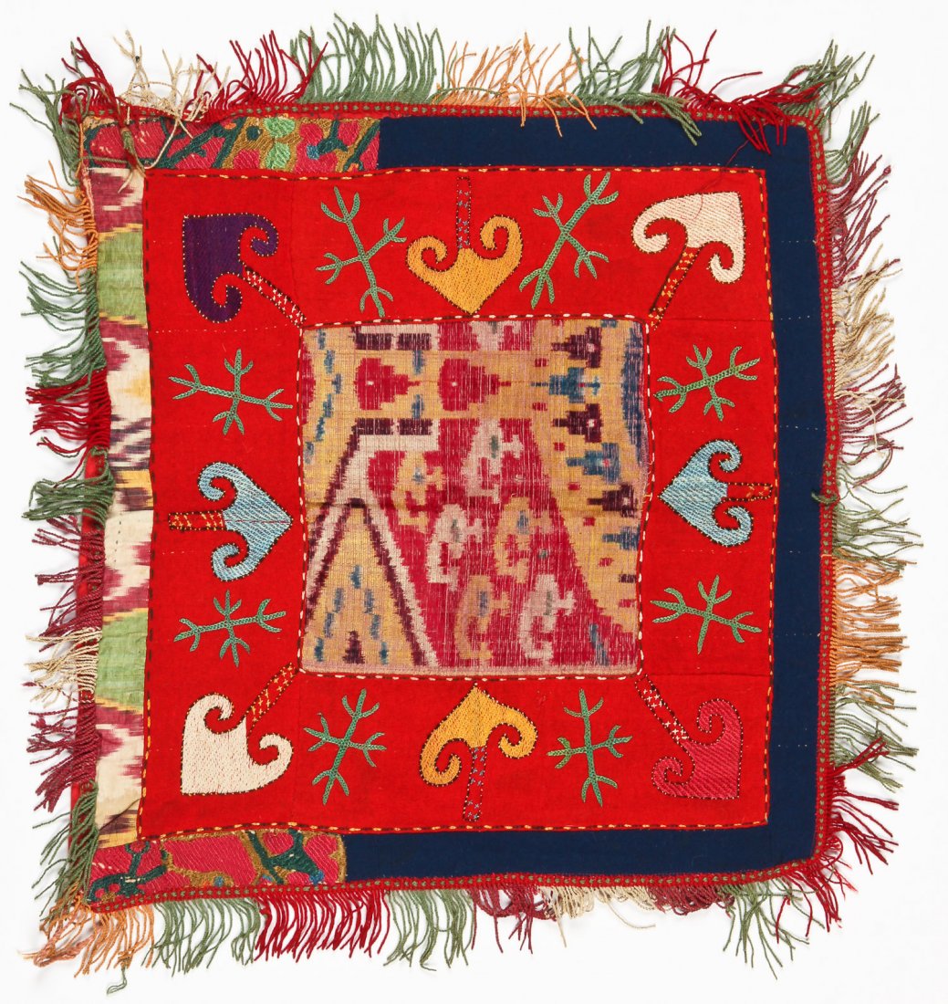 Antique Uzbek Square Panel: Antique Uzbek Square Panel; ; silk embroidery on red brushed wool, silk ikat center, border of dark blue brushed wool, silk and cotton ikat and pieces of silk couched stitch embroidery. 24" x 25" (61