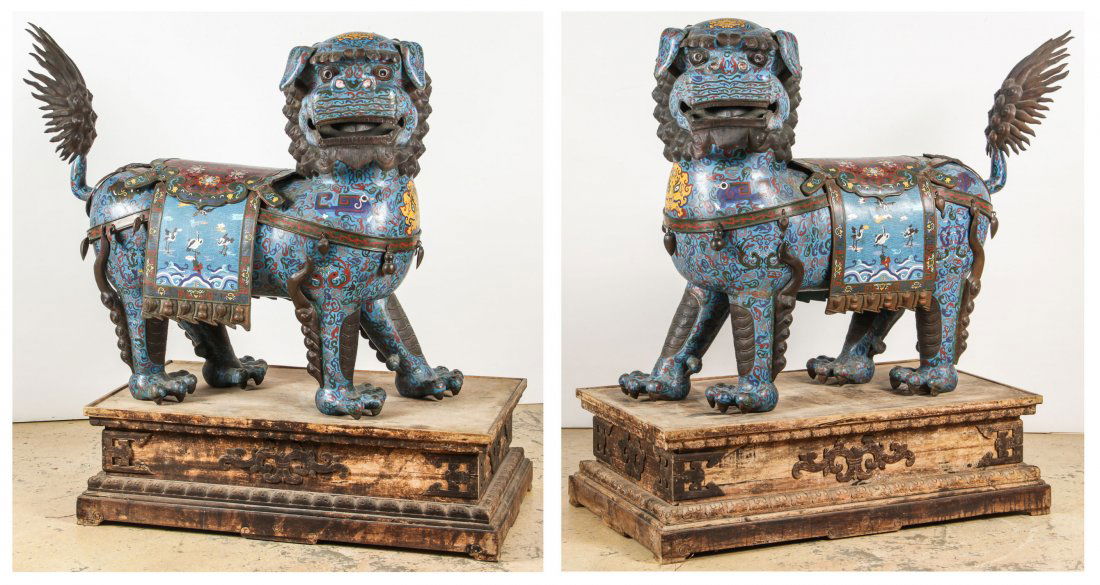 Pair of Palace-Size Cloisonne Foo Dogs, Qing D.: Pair of Palace-Size Cloisonne Foo Dogs, Qing D. Of imperial stature, the two blue cloisonne fu dogs stand on wooden bases in mirrored poses with their flame-like tails raised and heads turned with ope