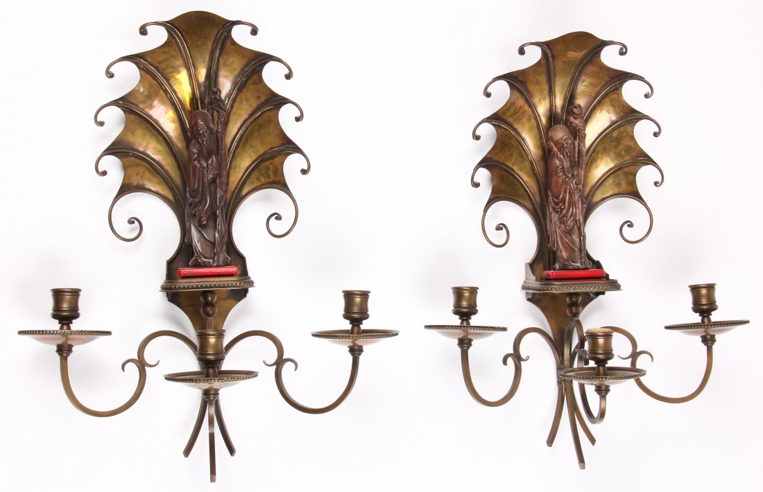 Pair of Asian Inspired Maison Jansen Style Sconces: Pair of Asian Inspired Maison Jansen Style Sconces. Circa 1930's. Composite figures on bronze bracket with 3 arms each. Each Size: 18" x 14" x 7" (46 x 36 x 18 cm).