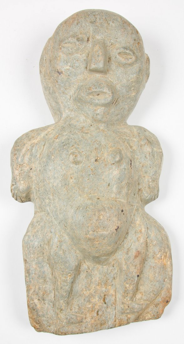 Raymond Coins (1904-1994) "Doll Baby", c. 1988: Raymond Coins (American, 1904-1994) "Doll Baby", c. 1988, carved river stone sculpture. Size: 22" x 11" x 4.5" (56 x 28 x 11 cm). Provenance: Robert Cargo, Alabama.