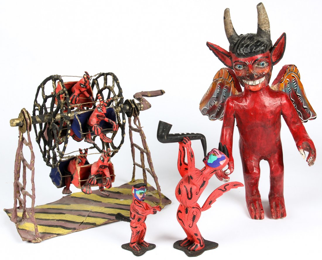 Vintage Mexican Diablos: Vintage Mexican Diablos. Including a winged devil, a papier mache Ferris wheel of devils, and 2 Jesus Sosa Calvo carved wood alebrijes. Largest Size: 14" x 18" x 8" (36 x 46 x 20 cm). Provenance: Bob 