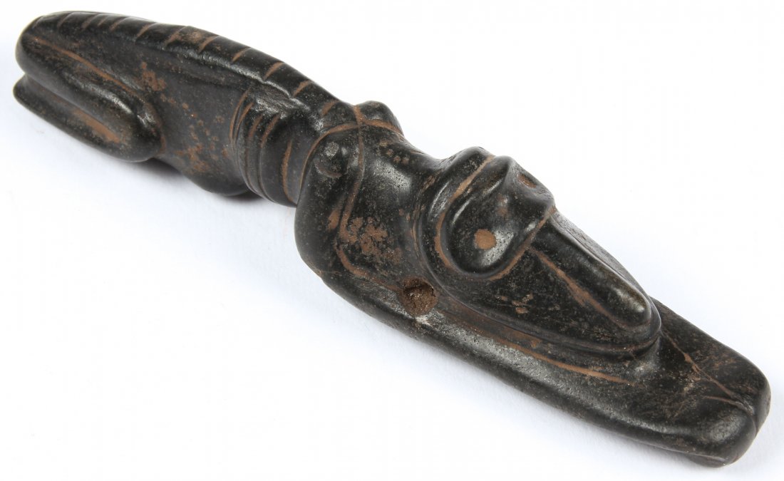 Impressive Taino Point of Focus Figure (1000-1500 CE): Impressive Taino Point of Focus Figure (1000-1500 CE), a reclining animal-like point of focus pendant with well defined eye surrounds and elongated nose. Made of basalt. Size: 5.25" x 1" x 1" (13 x 3 