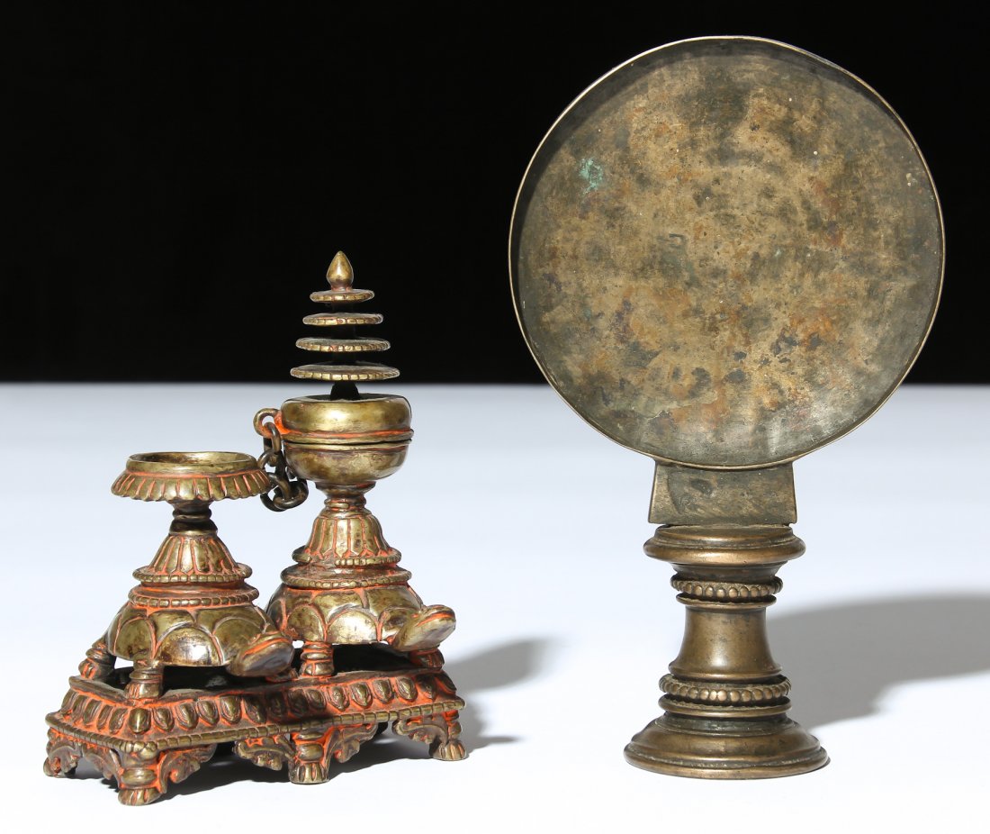 2 Rare Nepalese Ceremonial Items, Ca 1850: 2 Rare Nepalese Ceremonial Items used for special occasions, tika container and mirror, circa 1850, beautiful patina. Total weight: 1136 g. Ranging in size from 8"H, 21cm to 5.75"H x 4.25"W x 3"D, 15 