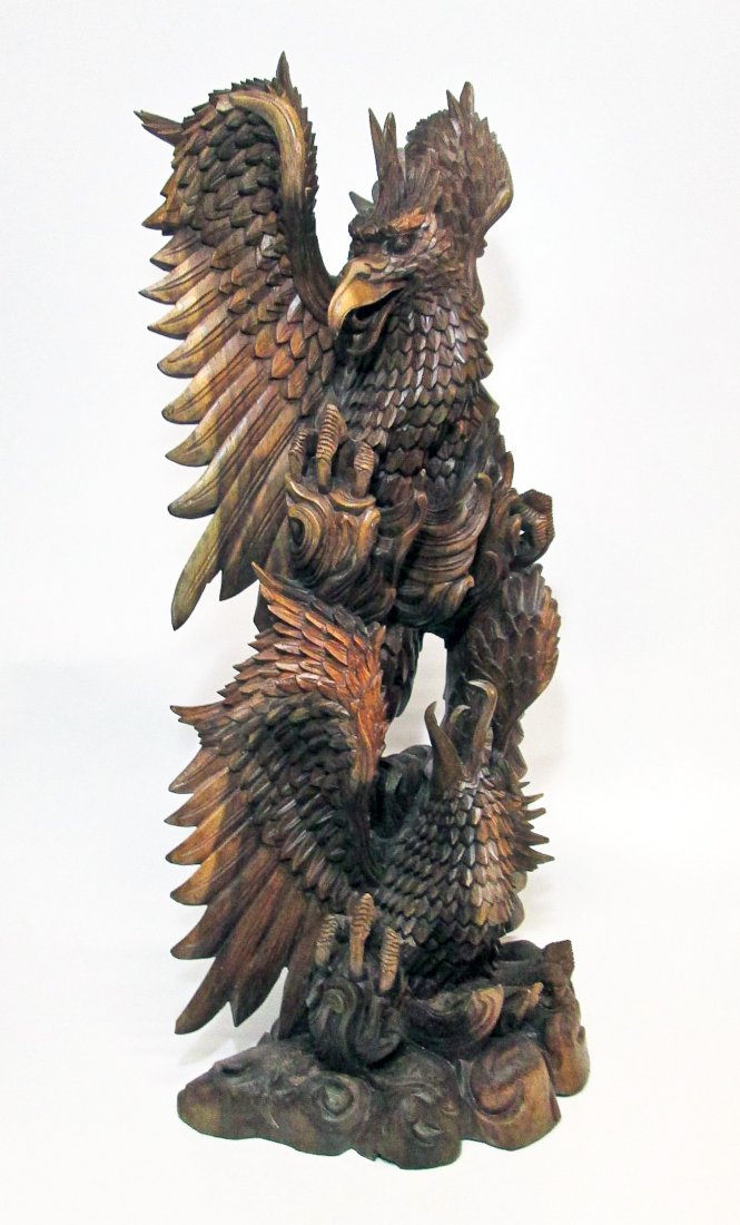 Large Ornate Eagle Carving, Bali: Large Ornate Eagle carving. Carved wooden sculpture of two eagles. Bali, Indonesia. Size: 41" x 18" (104 x 46 cm). Overall Fair condition, small chips, small loss to feathers in back, chip to one wing