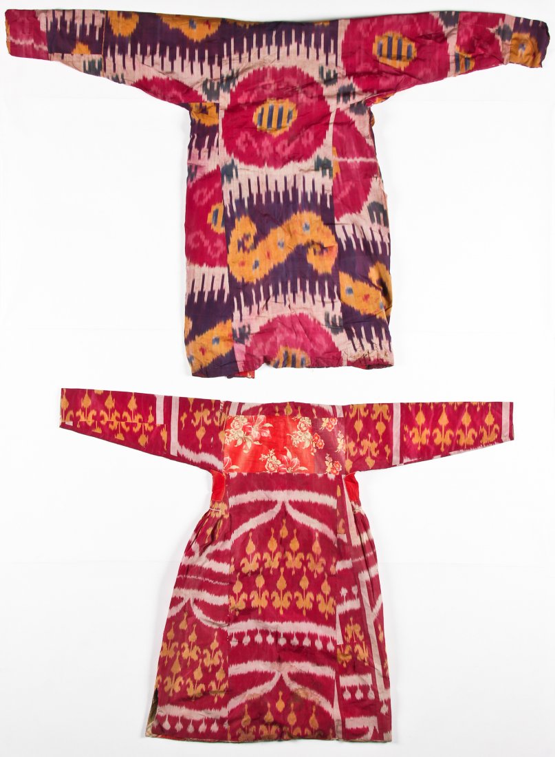 2 Old Central Asian Ikat Robes: 2 Old Central Asian Ikat Robes lined with cotton. 70" x 45" (178 x 114 cm) and 58" x 45" (147 x 114 cm).