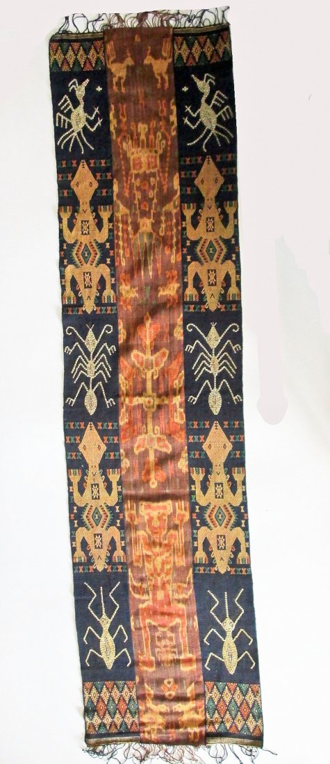 Large Sumba Ikat panel with Ancestor & Insect Motifs: Very large warp Ikat and Supplementary Ikat panels of various designs including ancestors, lobster, and insect motifs, several designs accented with sea shells. Sumba island, Indonesia. Size: 90" x 23