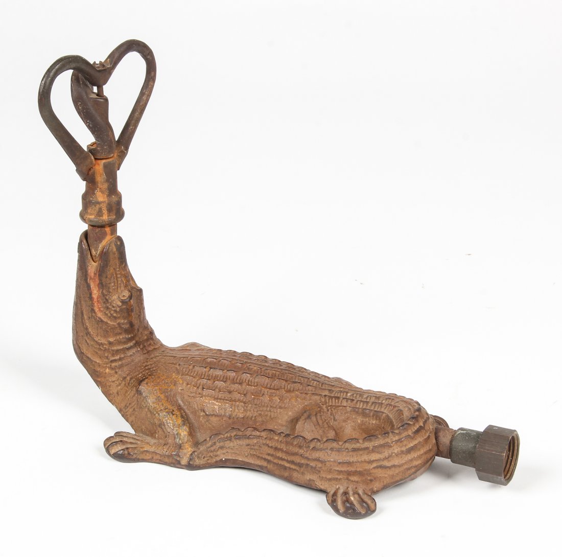 Cast Iron Alligator Lawn Sprinkler: Cast Iron Alligator Lawn Sprinkler. Size: 9" x 6" x 11" (23 x 15 x 28 cm).