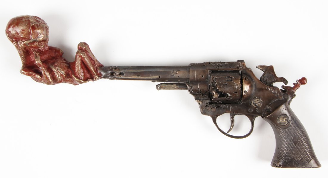 Steve Tobin (American, b. 1957) Bronze Sculpture: Steve Tobin (American, b. 1957) Bronze Sculpture, Fetus Emerging from Pistol, from the Toy Bronze Series, 1994-6; patinated cast bronze; a one of a kind, unique work, not multiples or a limited editio