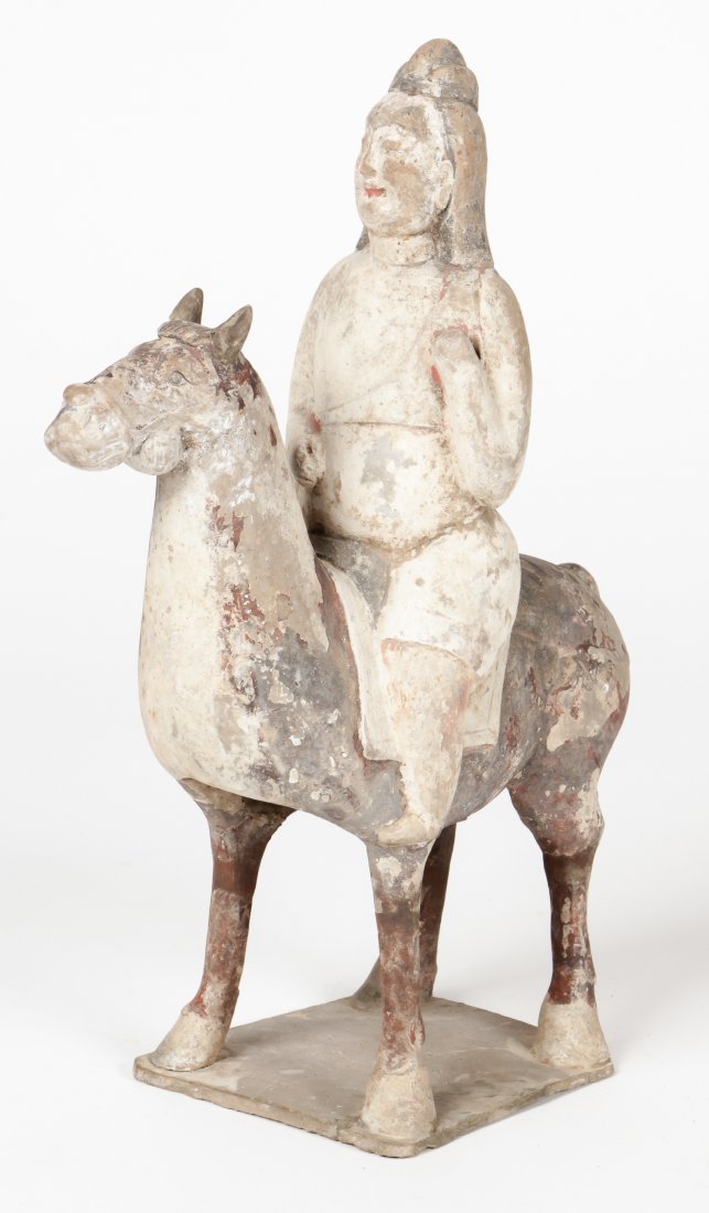 Han Dynasty Mounted Horse and Rider (206 BCE-9 CE): Han Dynasty Mounted Horse and Rider (206 BCE-9 CE) A painted gray pottery figure of horse and rider. Prov: lot 302, Christie's NY, Chinese Ceramics and Works of Art: see photo of invoice. Size 12.75" 