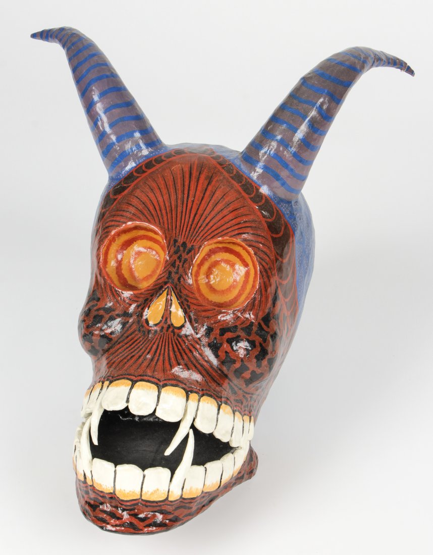 Antonio Joel Garcia (Mexican, b. 1955) Devil Calavera: Antonio Joel Garcia (Mexican, b. 1955) Devil Calavera, painted papier mache sculpture, with horns and fangs, signed. Size: 14" x 13" x 11" (36 x 33 x 28 cm). Provenance: Bob Brand and Liz Werthan, Phi