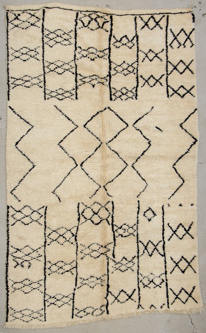 Vintage Moroccan Beni Ouraine Rug: 6'7" x 10'4" (200 x: Vintage Moroccan Beni Ouraine Rug. Hand-knotted with undyed natural shades of hand-spun sheep's wool; thick, shaggy, lustrous pile. Recently professionally cleaned. Size: 6'7" x 10'4" (200 x 314 cm). 