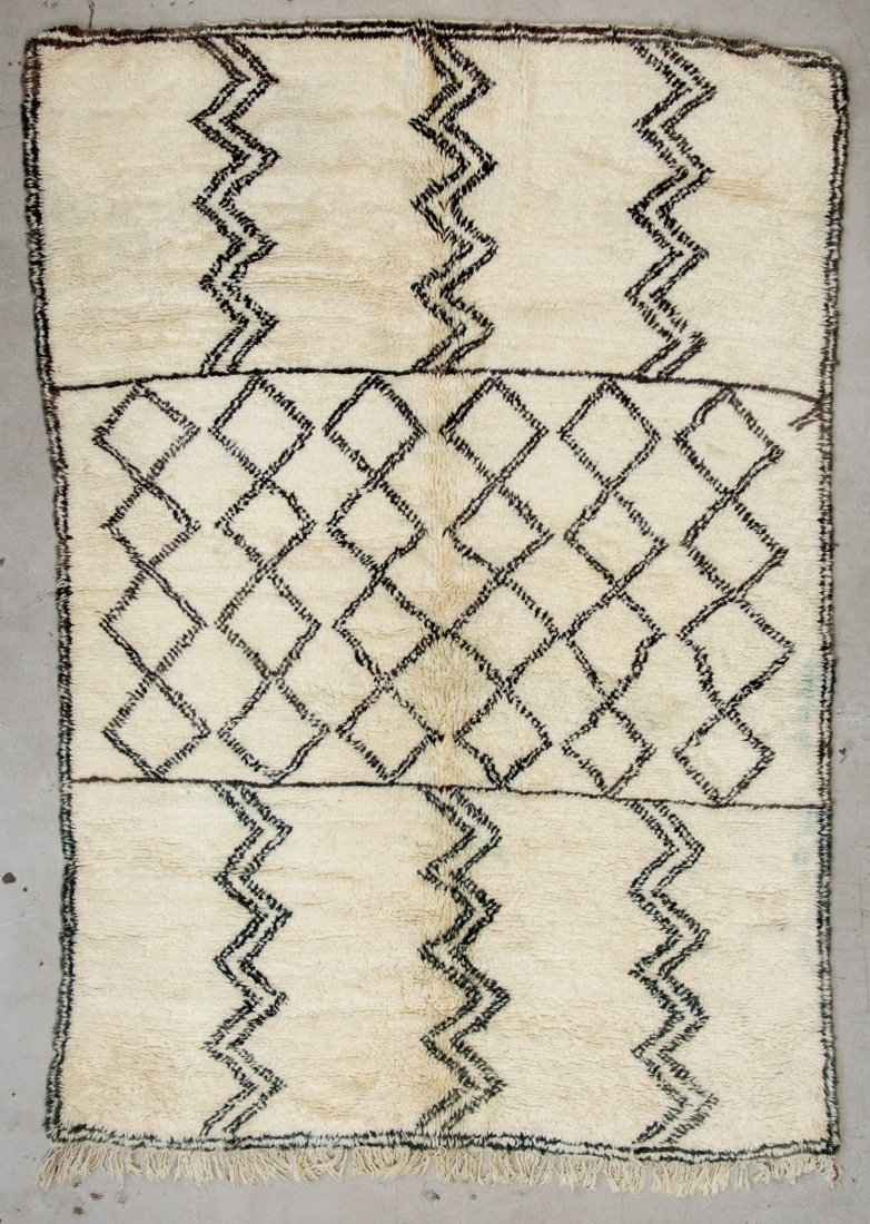 Vintage Moroccan Beni Ouraine Rug: 6'7" x 9'8" (200 x: Vintage Moroccan Beni Ouraine Rug. Hand-knotted with undyed natural shades of hand-spun sheep's wool; thick, shaggy, lustrous pile. Recently professionally cleaned. Size: 6'7" x 9'8" (200 x 295 cm). W