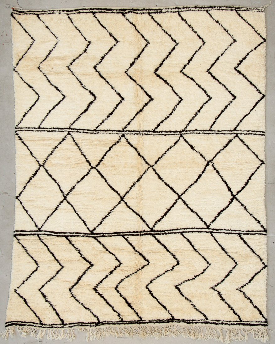 Vintage Moroccan Beni Ouraine Rug: 6'10" x 8'8" (208 x: Vintage Moroccan Beni Ouraine Rug. Hand-knotted with undyed natural shades of hand-spun sheep's wool; thick, shaggy, lustrous pile. Recently professionally cleaned. Size: 6'10" x 8'8" (208 x 264 cm). 