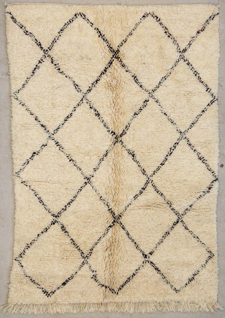 Vintage Moroccan Beni Ouraine Rug: 4'7" x 6'7" (140 x: Vintage Moroccan Beni Ouraine Rug. Hand-knotted with undyed natural shades of hand-spun sheep's wool; thick, shaggy, lustrous pile. Recently professionally cleaned. Size: 4'7" x 6'7" (140 x 200 cm). W