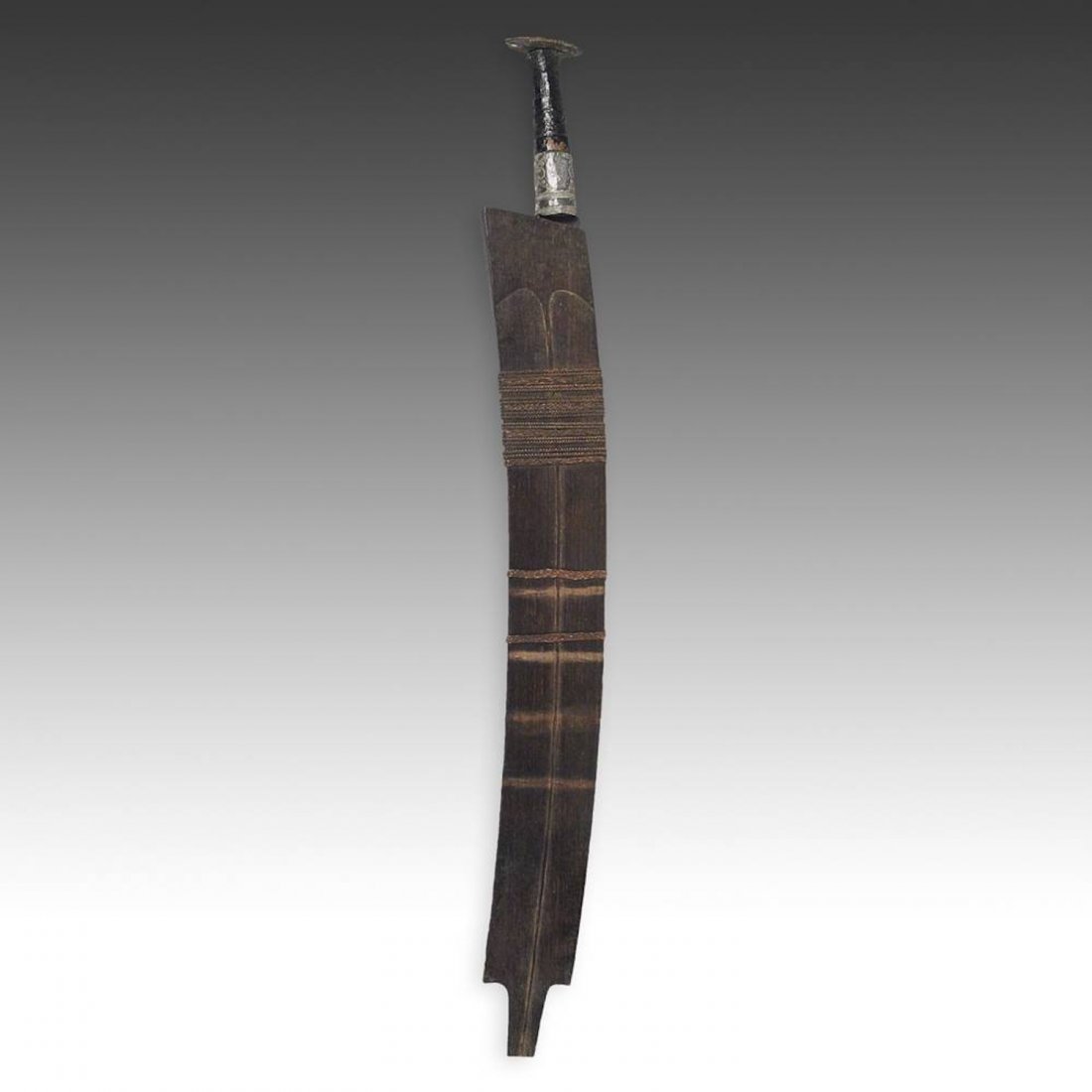 Nagaland Sword And Scabbard: Nagaland Sword And Scabbard, 20th C. Iron, wood and silver Size: 35"H x 3.5"W x 1.5"D (9 x 4 x 89 cm). PLEASE NOTE: All auction items are located in CHICAGO for preview and pick up at 130 N. Jefferson