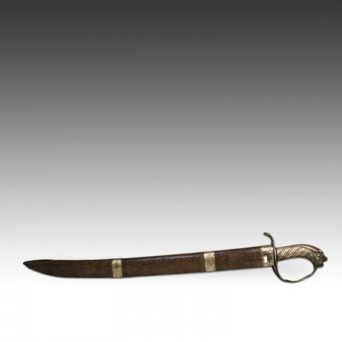 Antique Indonesian Ceremonial Sword, 19th C.: Antique Indonesian Ceremonial Sword, 19th C. Wood, metal, iron. Size: 30"H x 5.5"W x 4"D (14 x 10 x 76 cm). PLEASE NOTE: All auction items are located in CHICAGO for preview and pick up at 130 N. Jeff