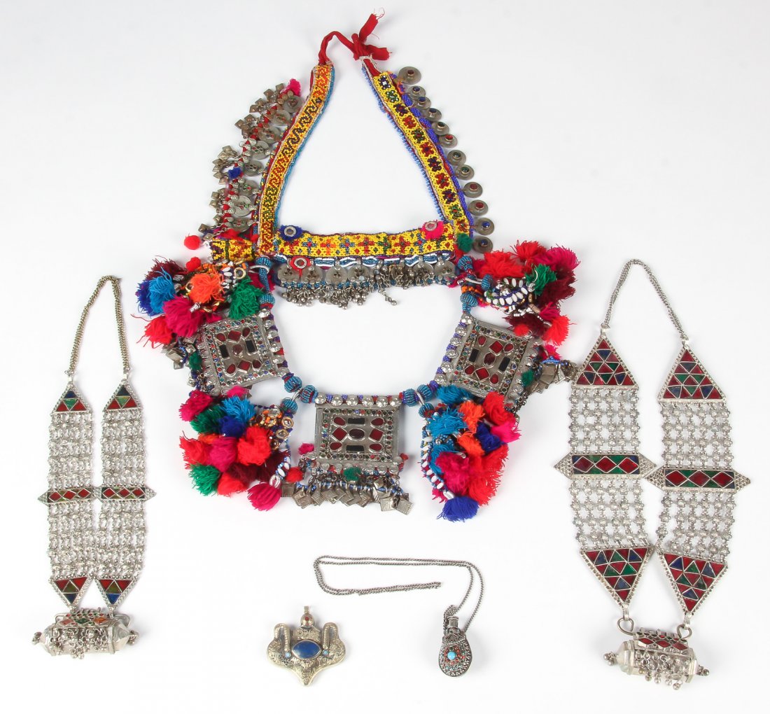 Mixed Lot of Central Asian Tribal Jewelry: Mixed Lot of Central Asian Tribal Jewelry, 20th c. Largest Size: 24" x 17", 61 x 43 cm. Provenance: Estate of Professor Louis Flam.