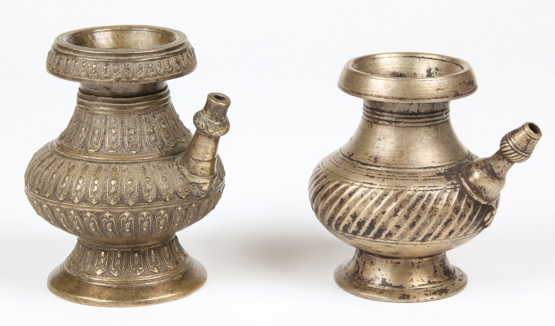 2 Antique Bronze Ewers (Koruwa), Nepal 19th c.: 2 Antique Bronze Ewers (Koruwa), Nepal 19th c., ornate, heavy, pinched design. Largest size: 5.5" x 4" x 5" (14 x 10 x 13 cm). Total weight: 1480 grams. Provenance: Matthew Friedman Collection. Matthe